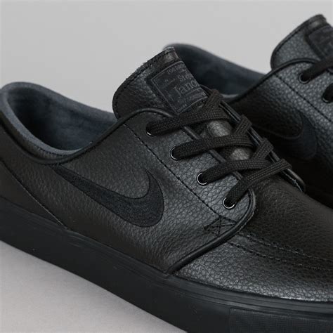 all black nike shoes leather.